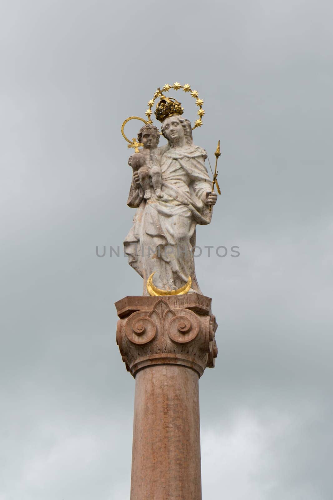 Column with Marian sculpture in Murnau, Bavaria, Germany