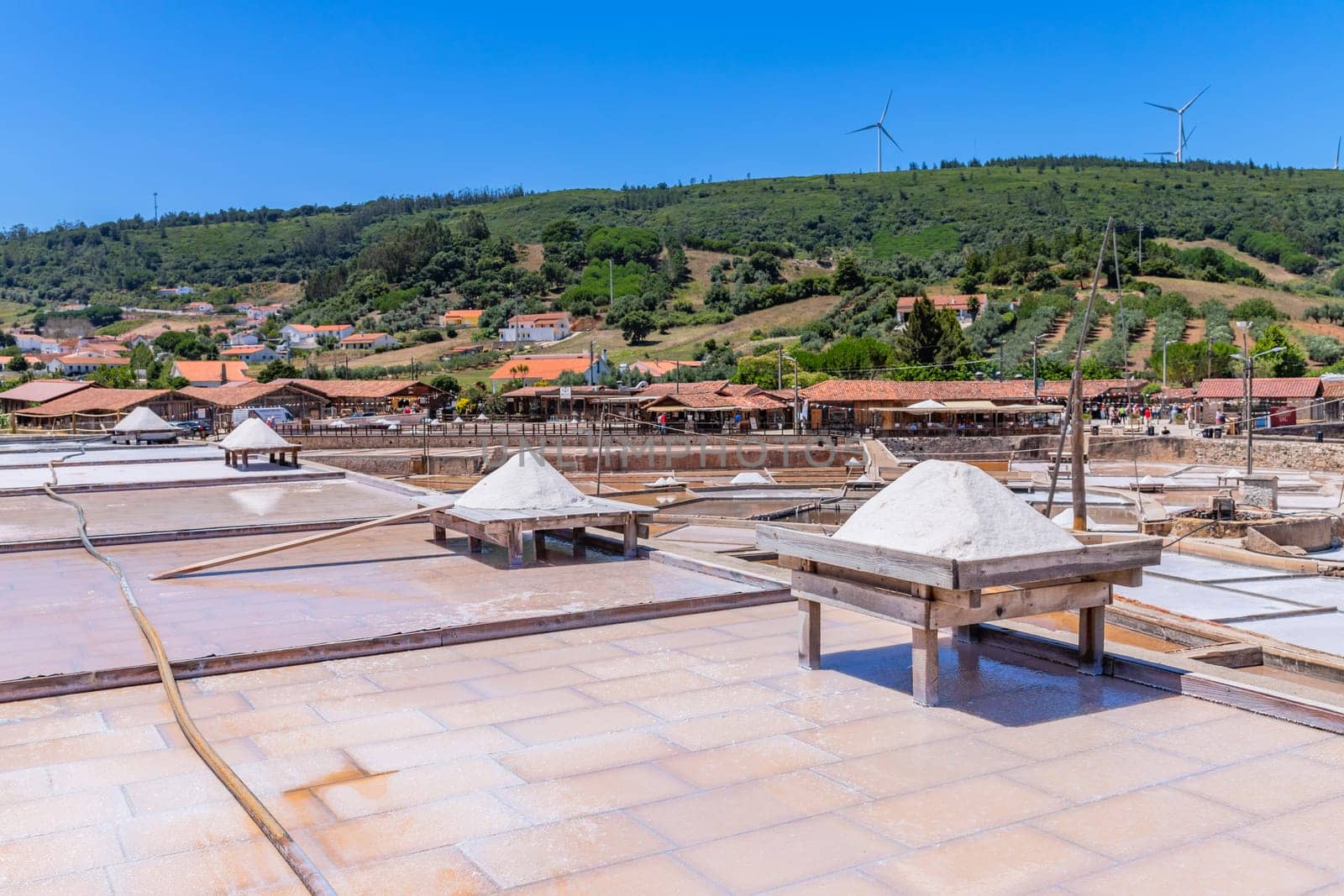 Rio Maior, Portugal: July 7, 2024: Fonte da Bica Salt Flats, aka Salinas de Rio Maior, system of shallow water compartments and gutters for salt extraction, Portugal