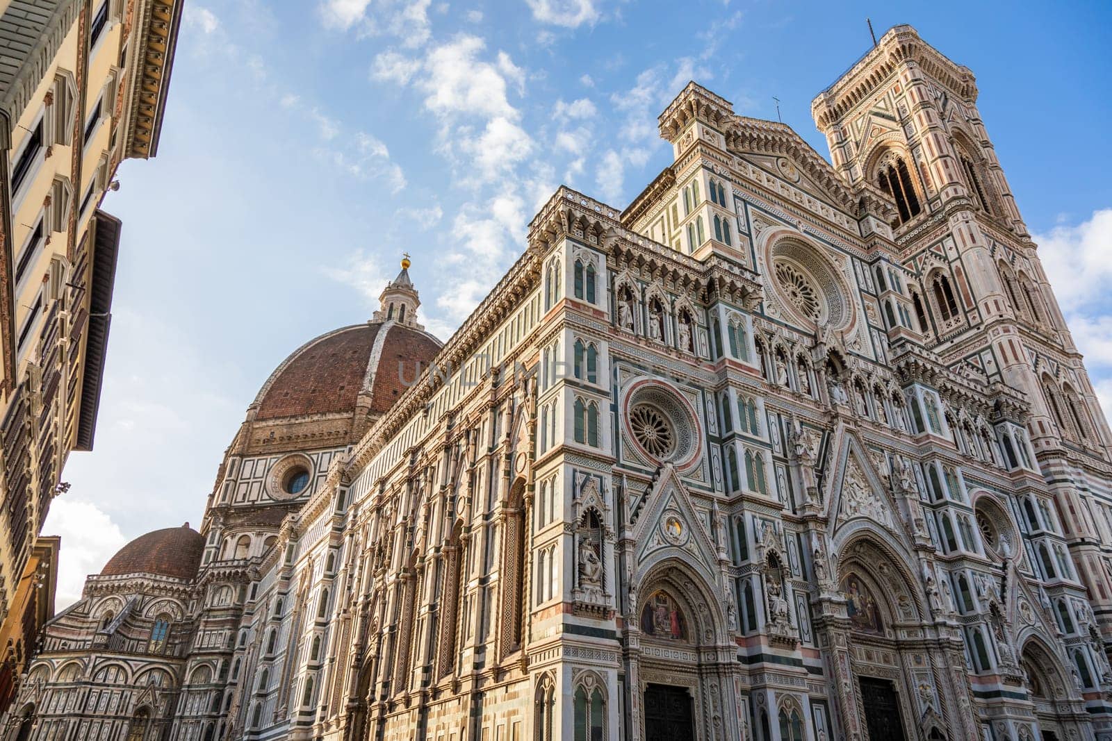 Florence, Italy. Cathedral of Santa Maria del Fiore, also named Duomo. Romantic and colorful architecture, Renaissance masterpiece. Sunrise light.
