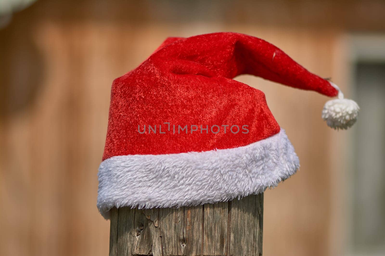 santa Claus hat is put on a pole. High quality photo
