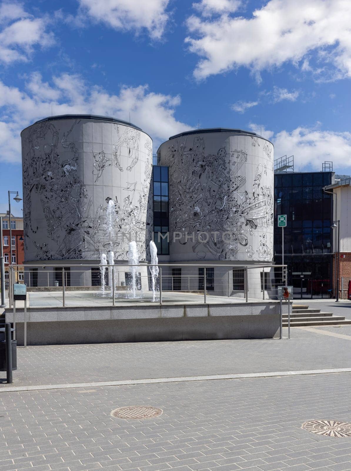 Lodz, Poland - May 4, 2023: EC1 Science and Technology Center, cooling towers with wall mural. New Center is next to the Lodz Fabryczna Railway Station
