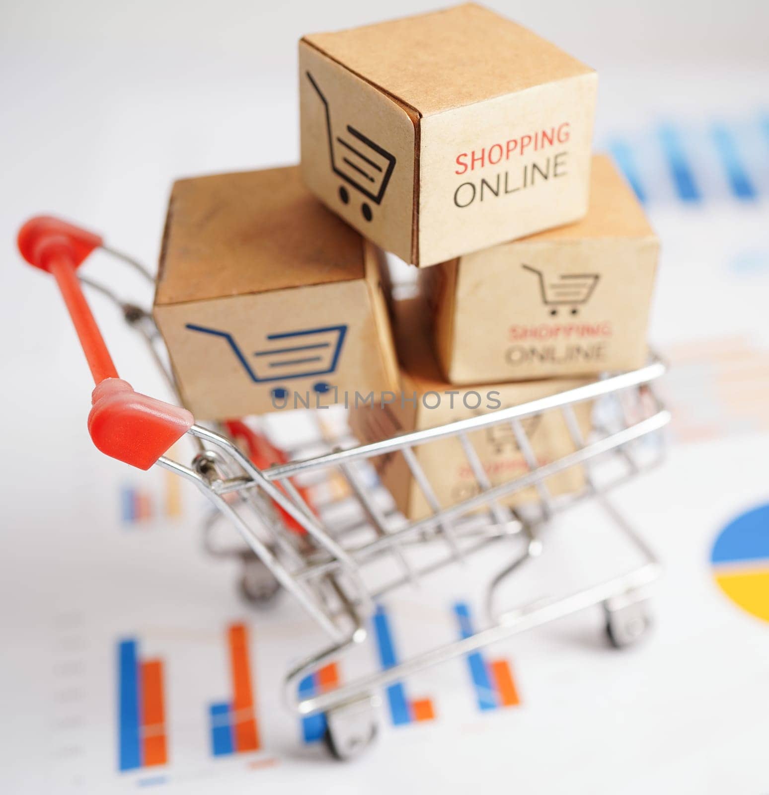Online shopping, Shopping cart box on business graph, import export, finance commerce.