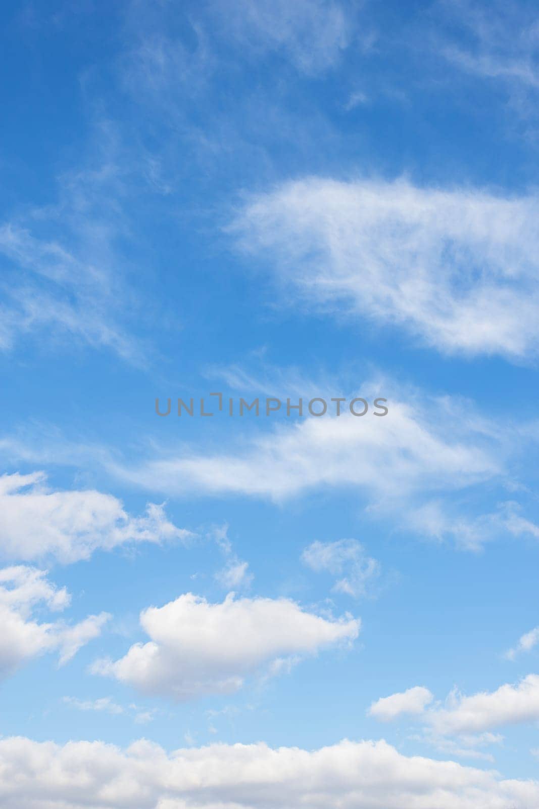 Blue sky with white clouds. It can be used as texture and background.