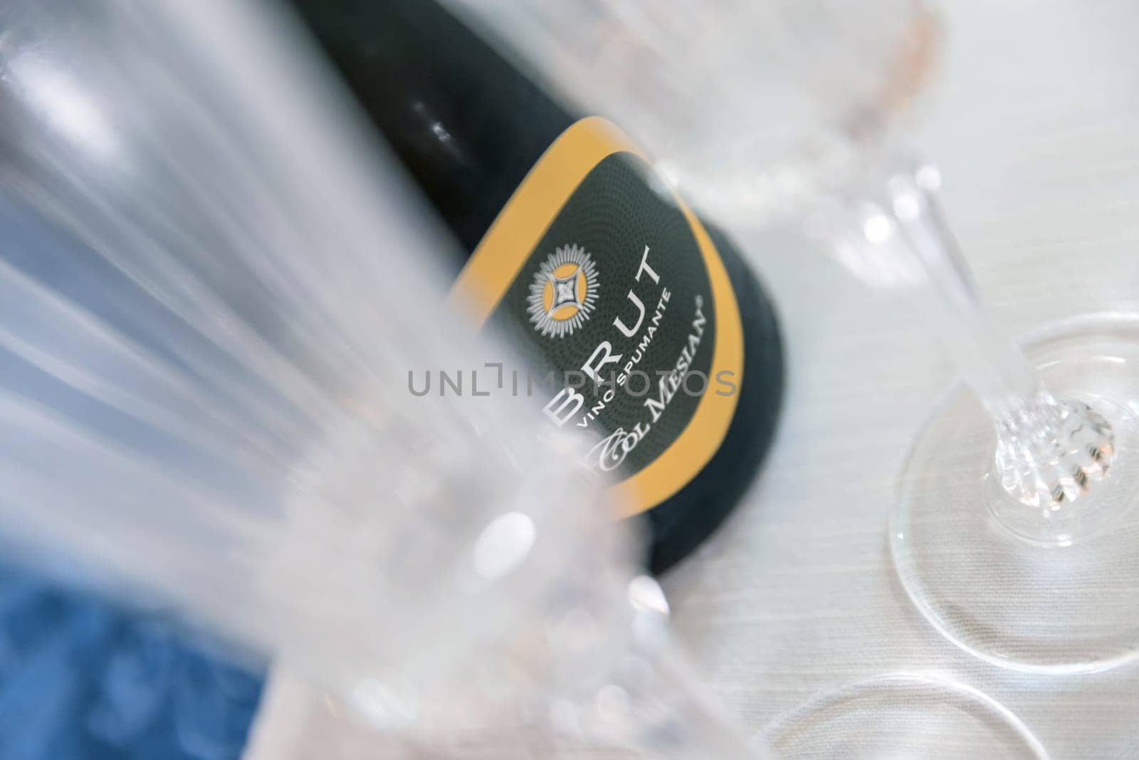 Aperitif in restaurant party with friends, champagne celebration. Bergamo, ITALY - May 25, 2024.