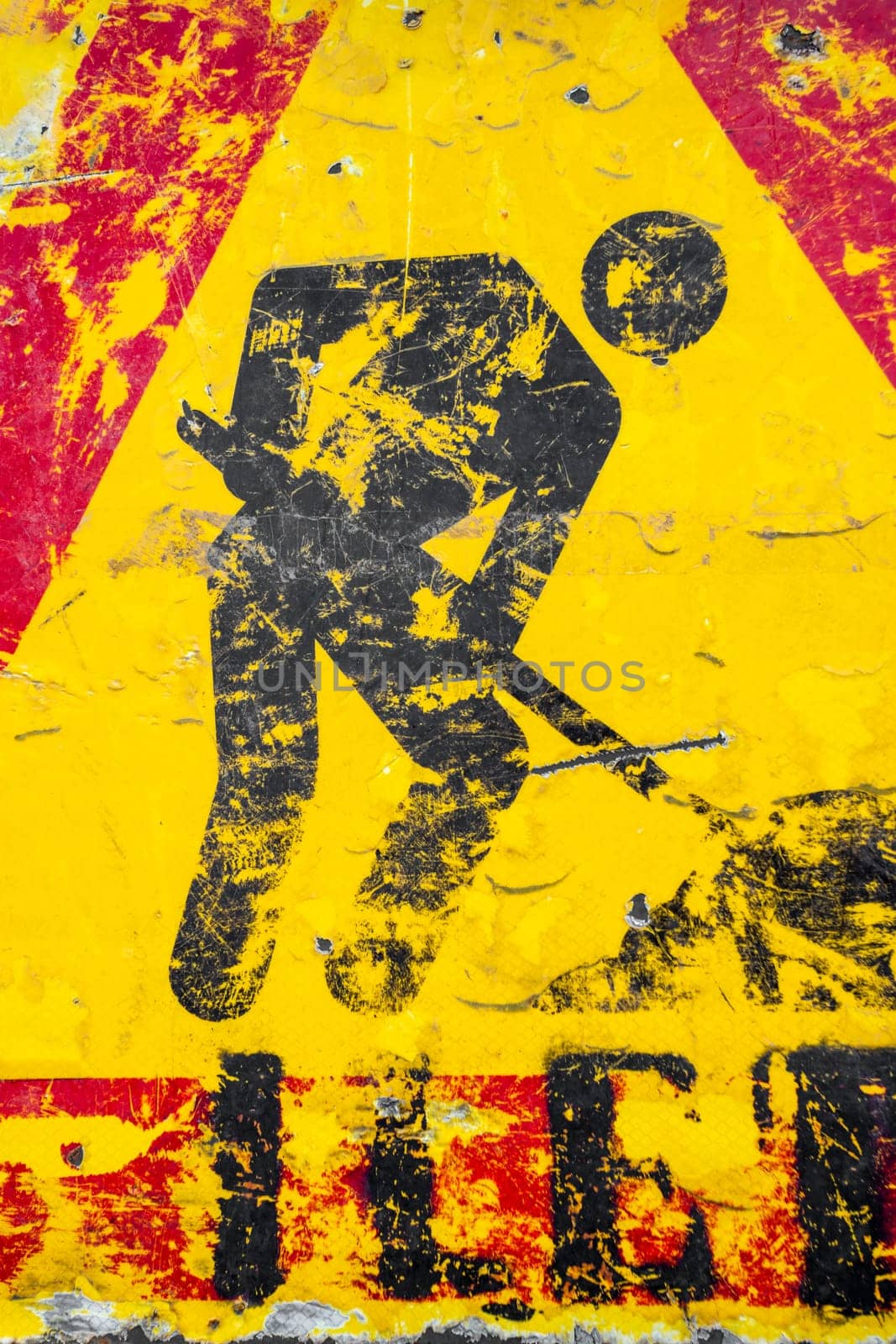 Men at work road sign. Warning of construction works ahead. Grunge look.