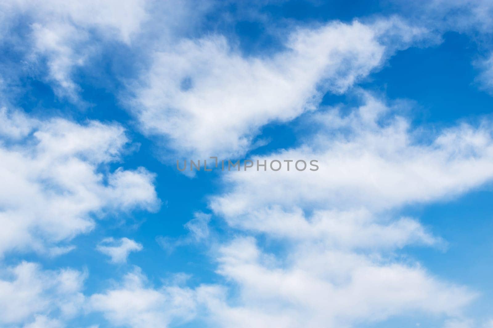 Blue sky background with white clouds. Concepts and textures.