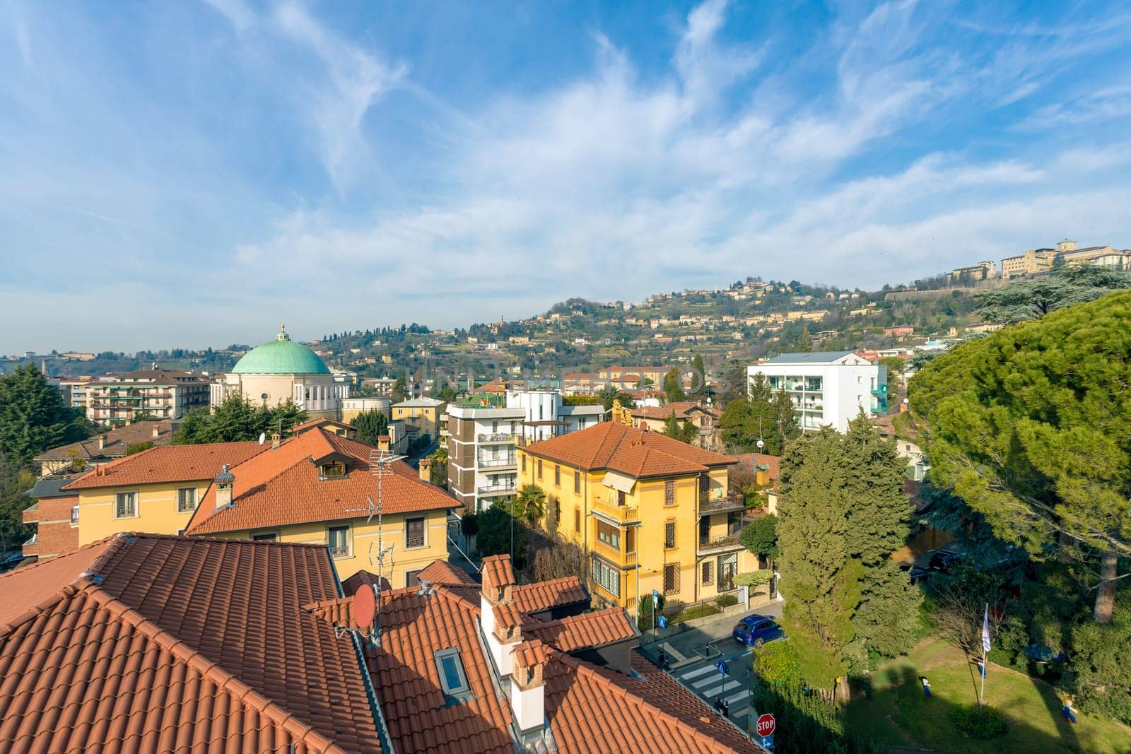 View of Bergamo, upper town and Bergamo hills. Capital of culture. Bergamo, ITALY - January 31, 2024.