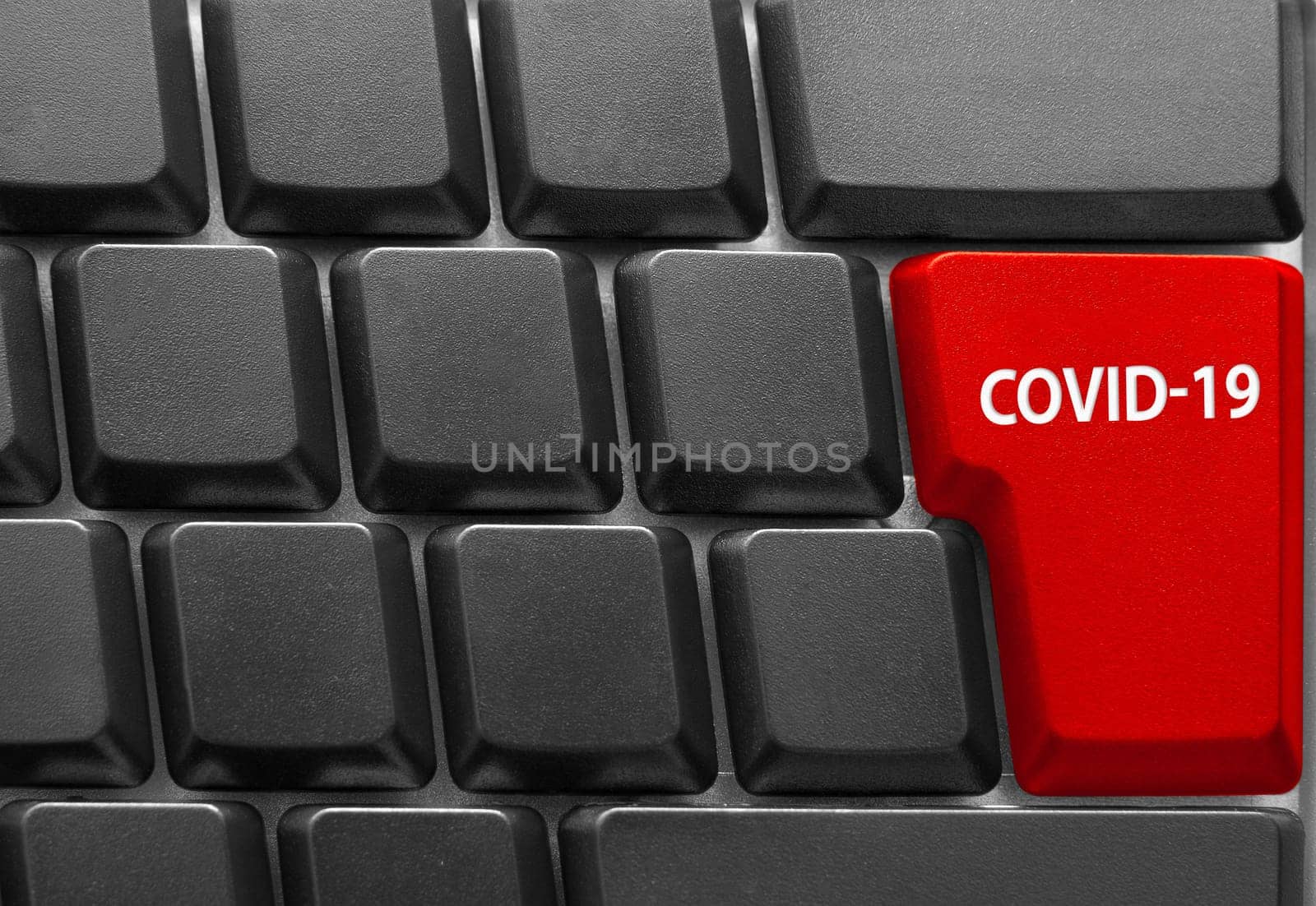 Close-up of Computer keyboard, with COVID-19 key