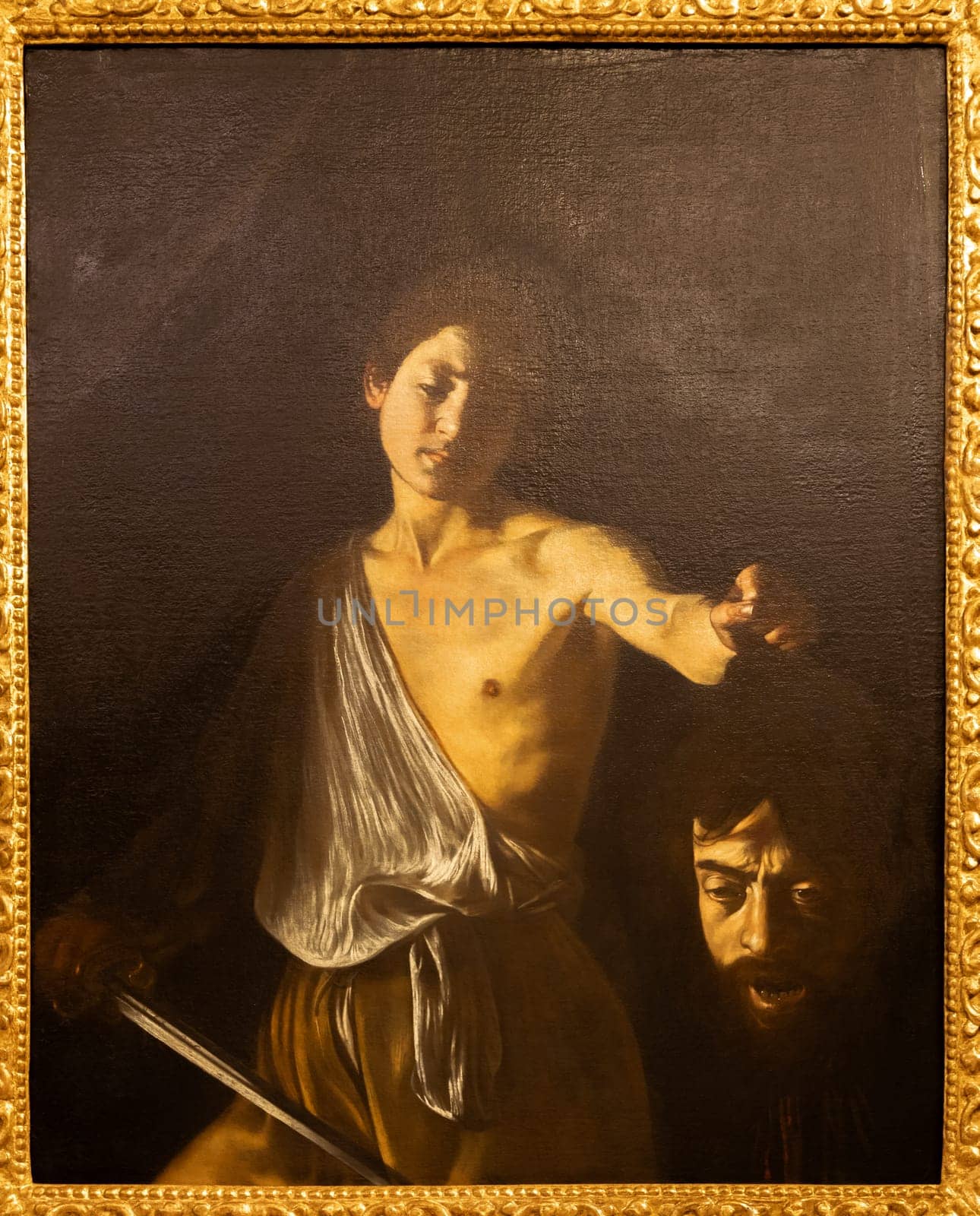 Rome, Italy - 28 December 2023: David with the head of Goliath, by Caravaggio, 1610 - oil on canvas - cm 125 x 101, Galleria Borghese