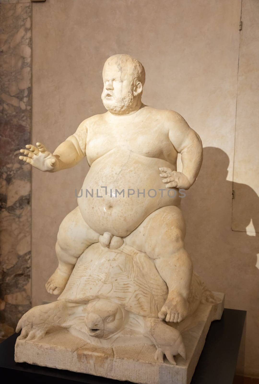 Florence, Italy - 28 December 2023: Morgante riding a tortoise, marble statue by Valerio Cioli, 1568. The dwarf Morgante belonged to the Medici family entourage. Original sculpture located in Boboli Gardens.