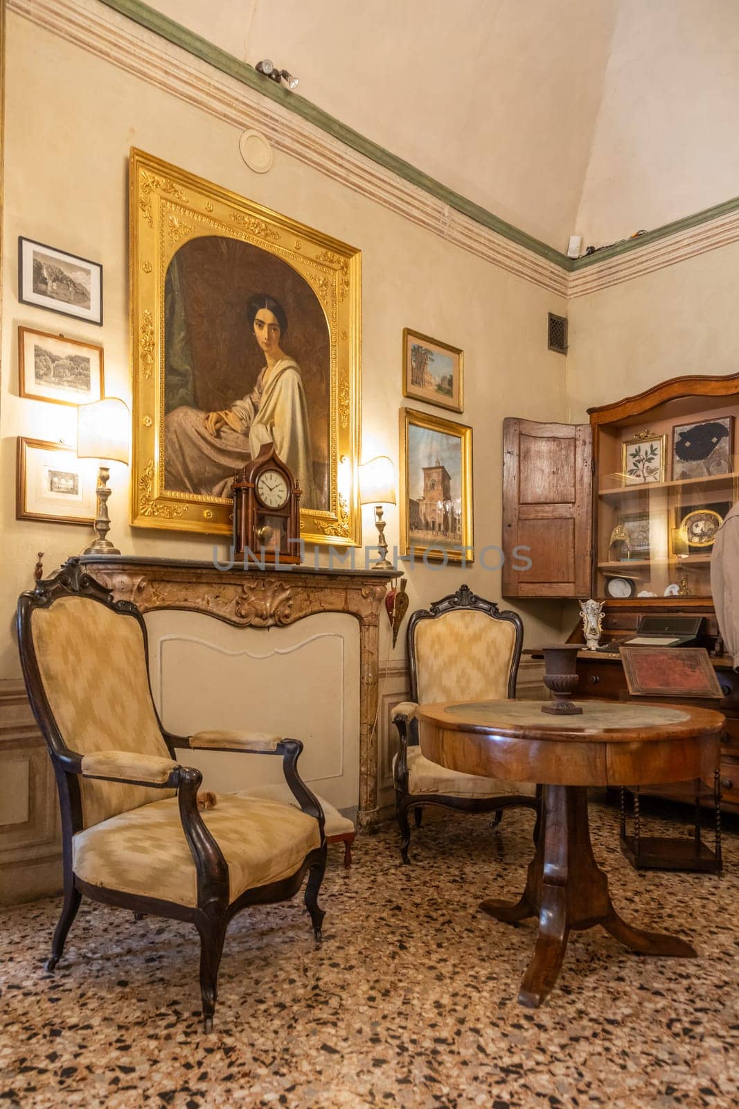 Masino, Italy - 12 December 2023: old apartment interior, early 20th century furniture, living room, nobody
