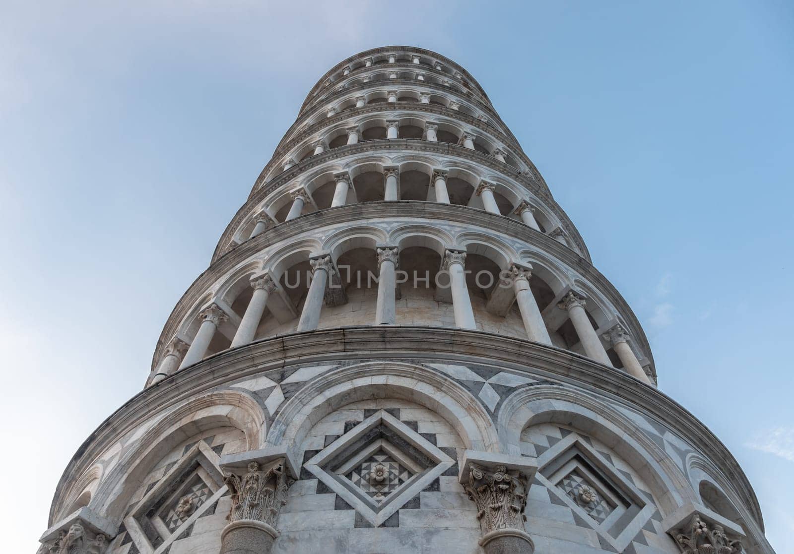 Pisa, Italy. Leaning tower sightseeing with blue sky background. Italian travel destination