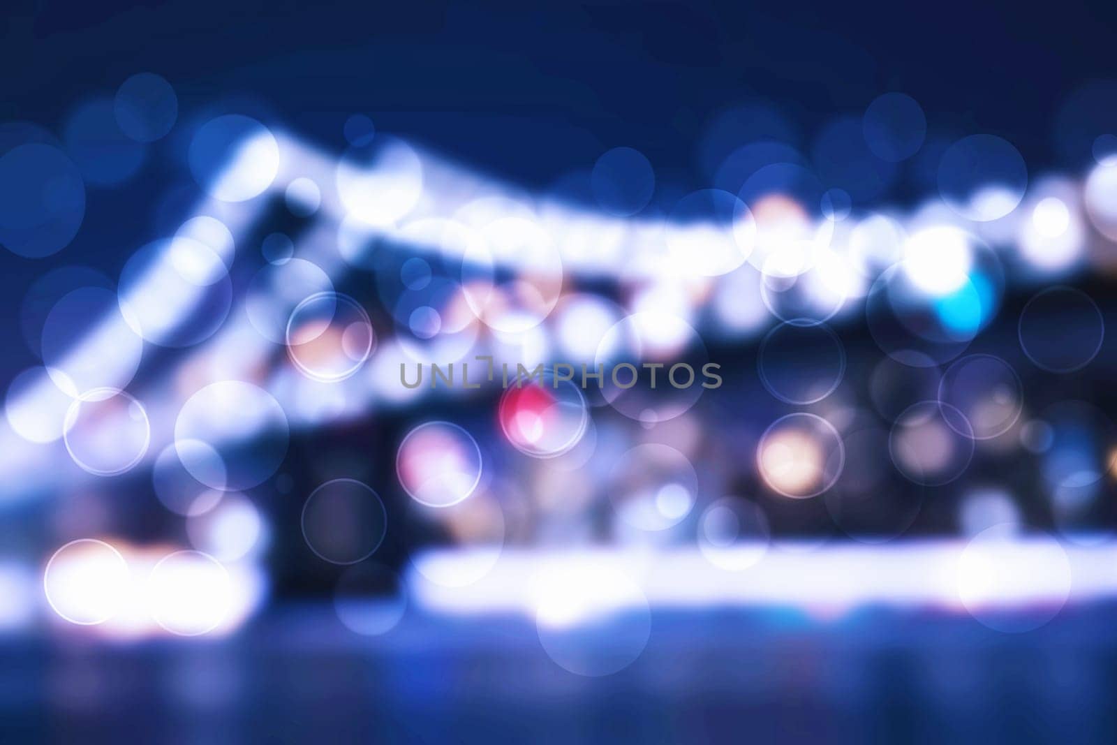 Abstract blurred entertainment concert lights on stage. Vibrant colors come to life at the night. Disco party background.