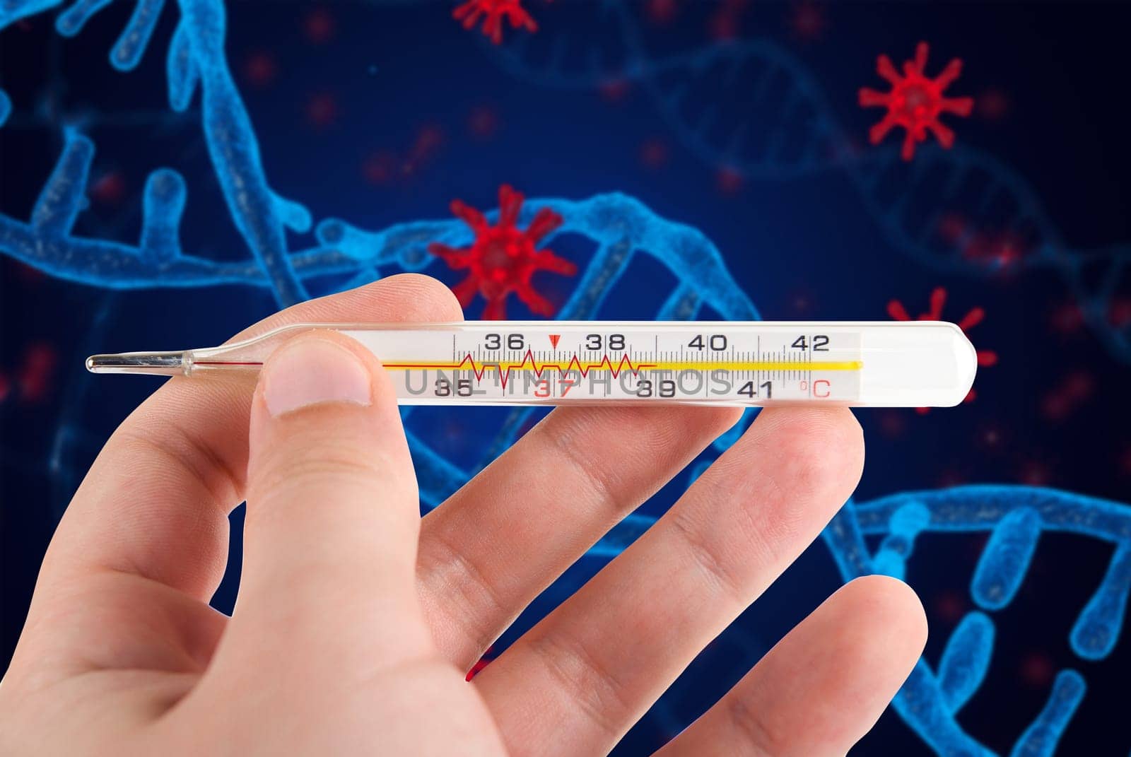 Hand with a medical thermometer on COVID-19 background. Concept of corona virus.