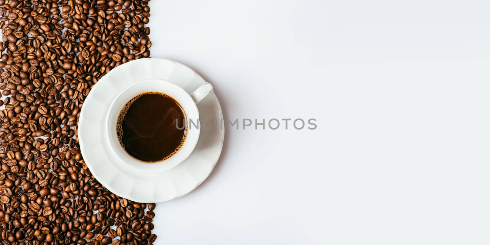 Top view of coffee cup on coffee bean texture and white background. Minimal art design layout. Restaurant cafe shop creative menu.