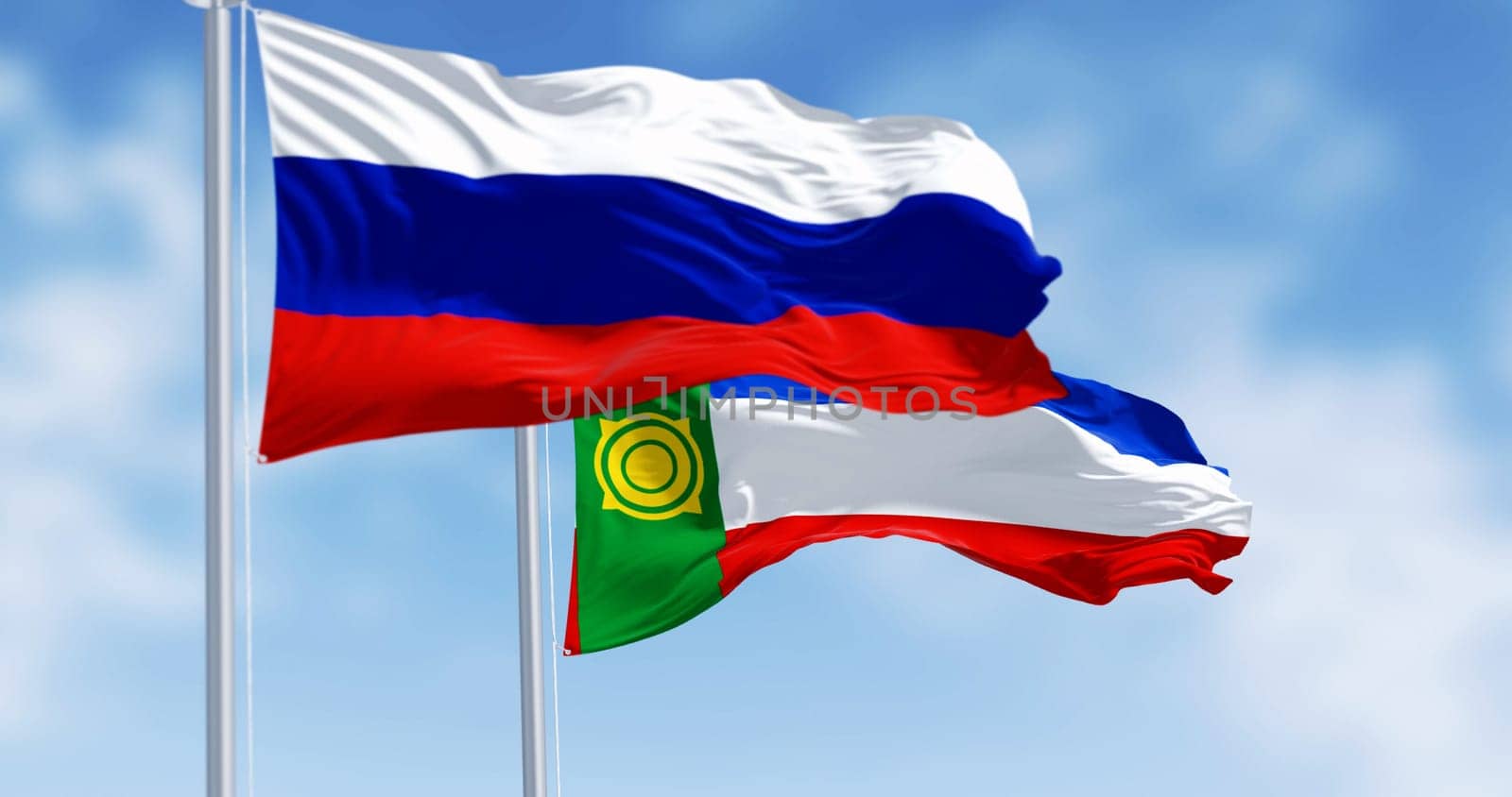 Flags of Russia and Khakassia waving in the wind on a clear day. Republic of the Russian Federation. 3d illustration render. Selective focus