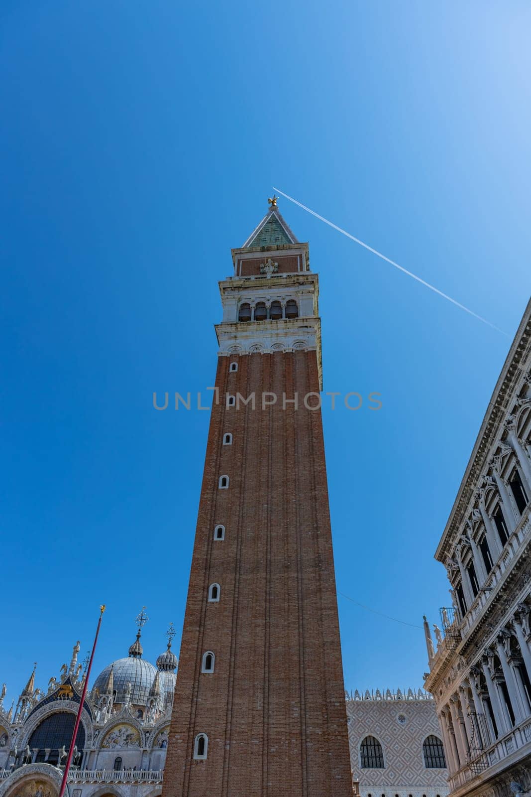 Close up of the San Marco Campanile. St Mark's bell tower located on the Piazza San Marco in Venice, Italy.