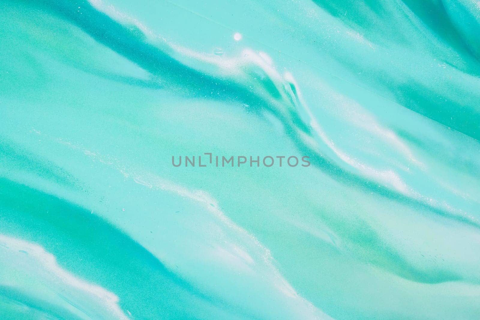 Detail of color graffiti waves painted on the wall