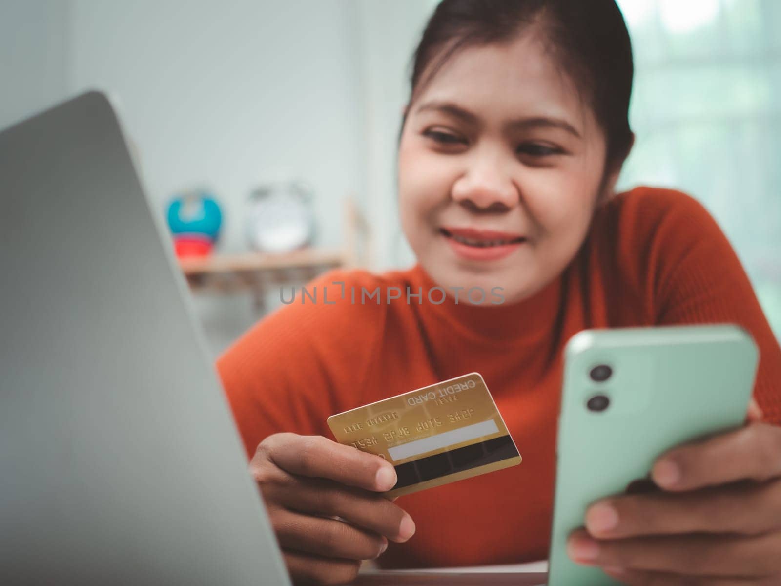 Online banking transaction concept, Happy woman with credit card using smart phone and shopping online, Ecommerce and secure mobile banking concept, Making online payments.
