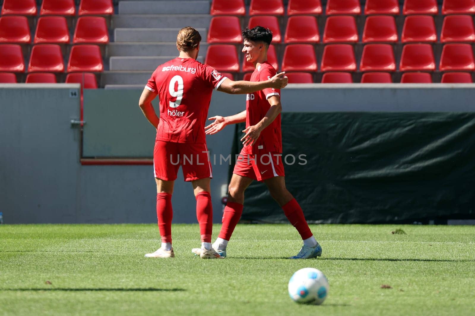 Lucas Höler (SC Freiburg) congratulates goalscorer Marco Wörner (SC Freiburg) on the 2-0 win in the friendly match: SC Freiburg - FC Basel  REGULATIONS PROHIBIT ANY USE OF PHOTOGRAPHS AS IMAGE SEQUENCES AND/OR QUASI-VIDEONann  Photo: Joachim Hahne/johapress