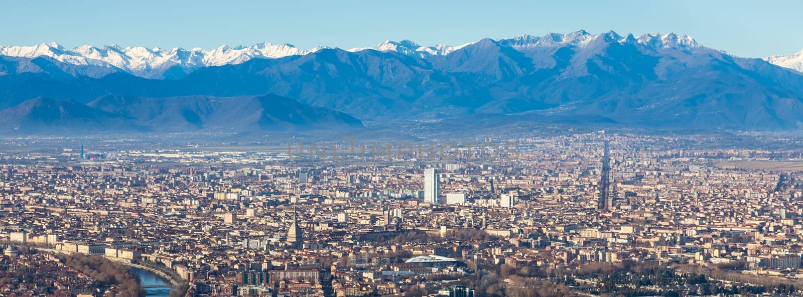 Turin, Italy - 24 December 2023: panoramic view with Alps and blue sky