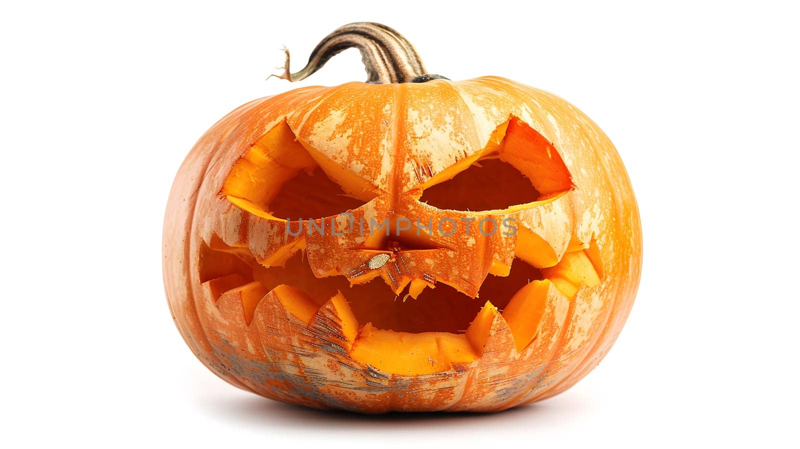 Carved Halloween jack o lantern pumpkin isolated on white background