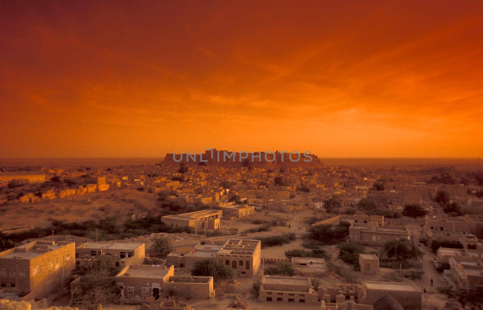 a view of the Jaisalmer Fort with the city of Jaisalmer in the Province of Rajasthan in India.  India, Jaisalmer, January, 1998