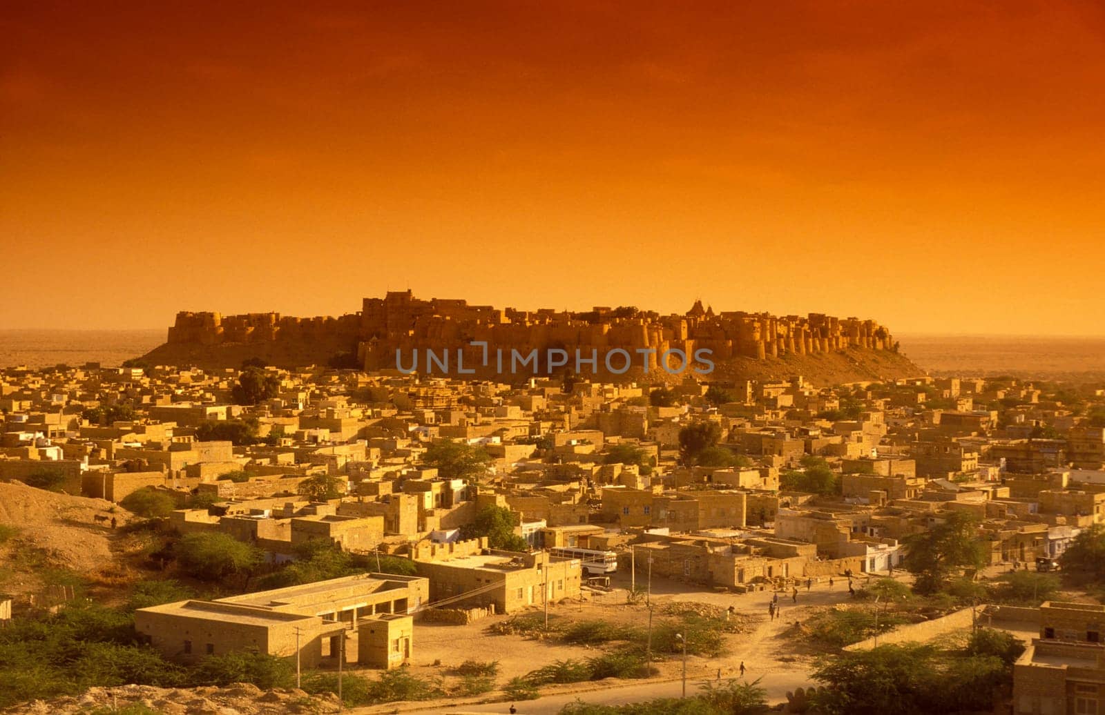 a view of the Jaisalmer Fort with the city of Jaisalmer in the Province of Rajasthan in India.  India, Jaisalmer, January, 1998