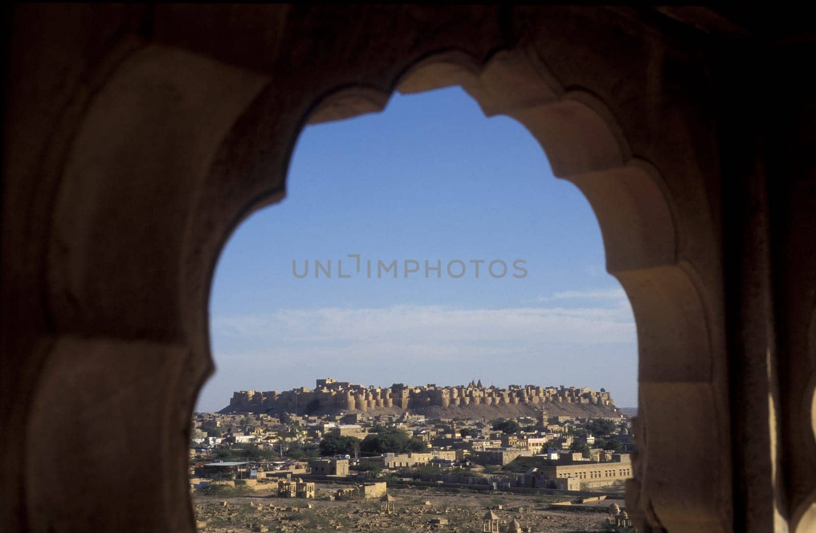 a view of the Jaisalmer Fort with the city of Jaisalmer in the Province of Rajasthan in India.  India, Jaisalmer, January, 1998