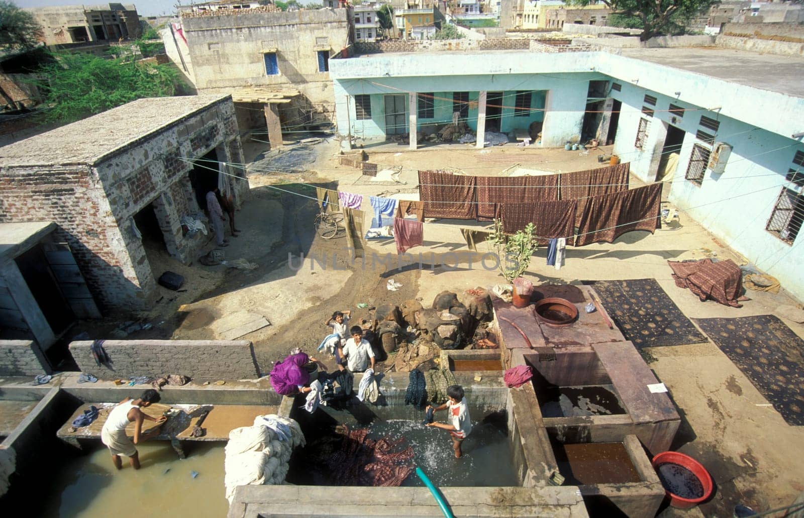 a public Laundry in the old Town in the Jaisalmer Fort with the city of Jaisalmer in the Province of Rajasthan in India.  India, Jaisalmer, January, 1998