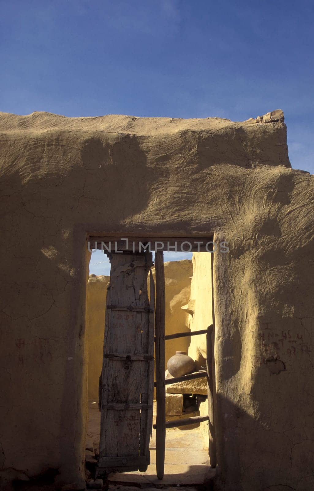 a old Stone House near the Town of Jaisalmer in the Province of Rajasthan in India.  India, Jaisalmer, January, 1998