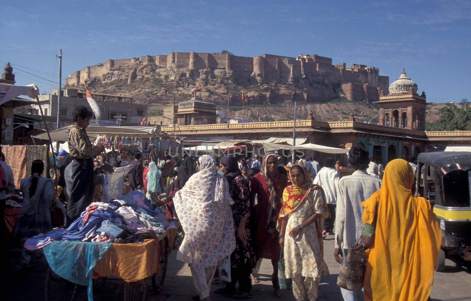 a streetmarket at a square in the city of Jaisalmer in the Province of Rajasthan in India.  India, Jaisalmer, January, 1998