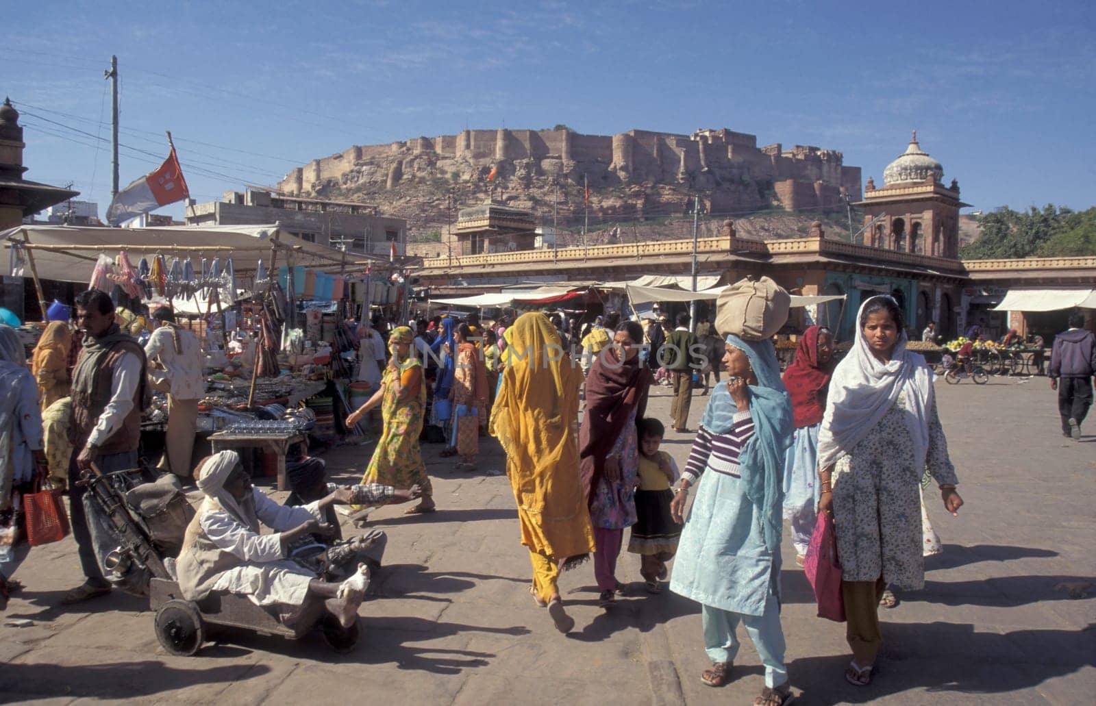 a streetmarket a square in the city of Jaisalmer in the Province of Rajasthan in India.  India, Jaisalmer, January, 1998