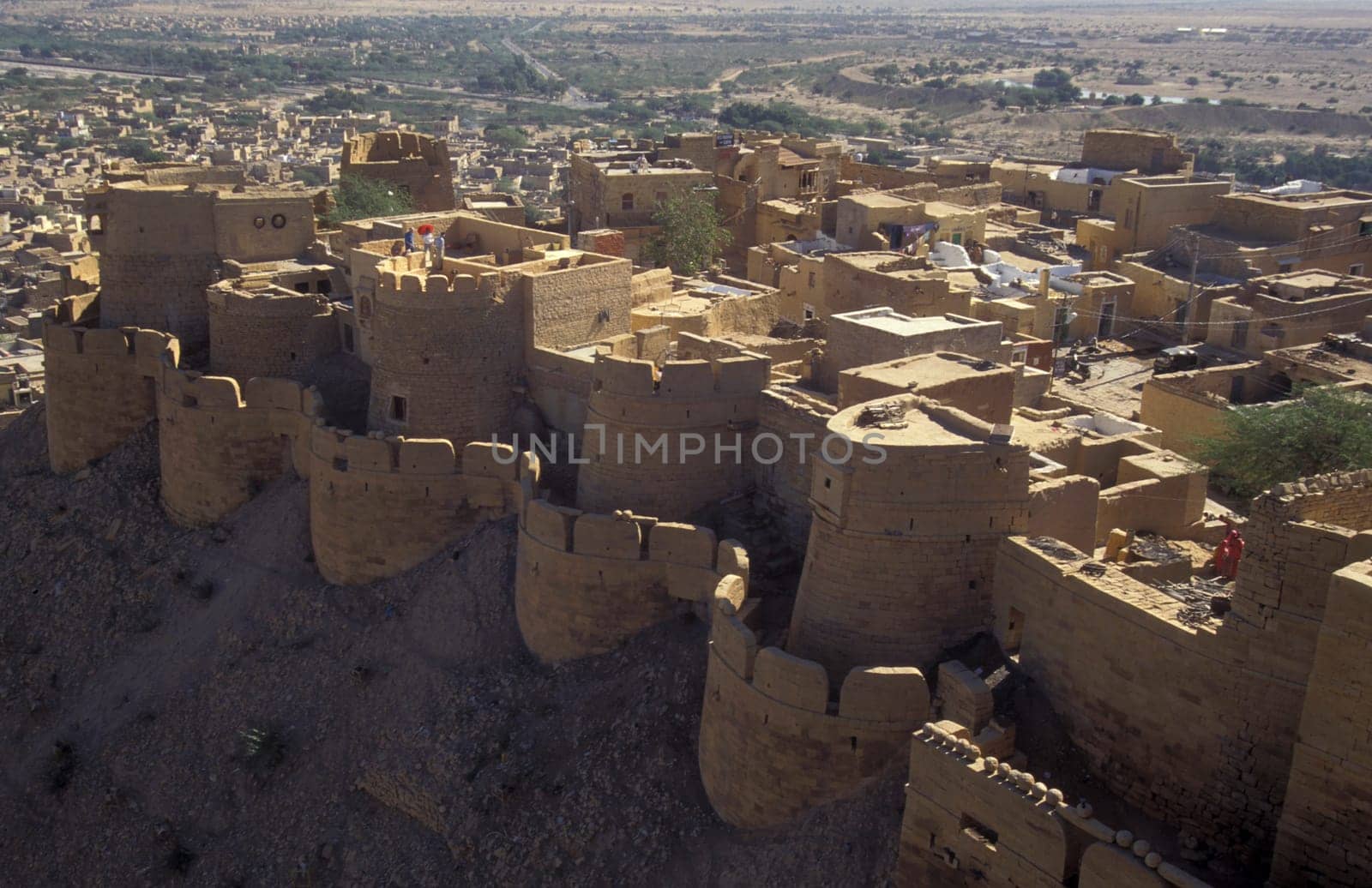 a view of the Jaisalmer Fort with the city of Jaisalmer in the Province of Rajasthan in India.  India, Jaisalmer, January, 1998
