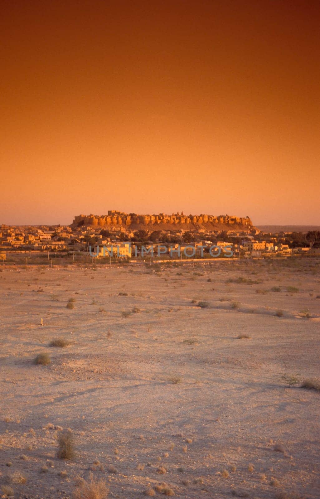a view of the Jaisalmer Fort with the city of Jaisalmer in the Province of Rajasthan in India.  India, Jaisalmer, January, 1998