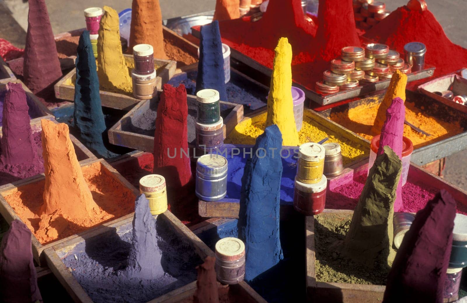 lots of Bindi poweder in defrent colors at a market in the Town of Jaisalmer in the Province of Rajasthan in India.  India, Jaisalmer, January, 1998