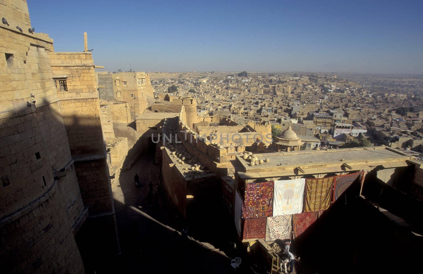 a view of the Jaisalmer Fort with the city of Jaisalmer in the Province of Rajasthan in India.  India, Jaisalmer, January, 1998