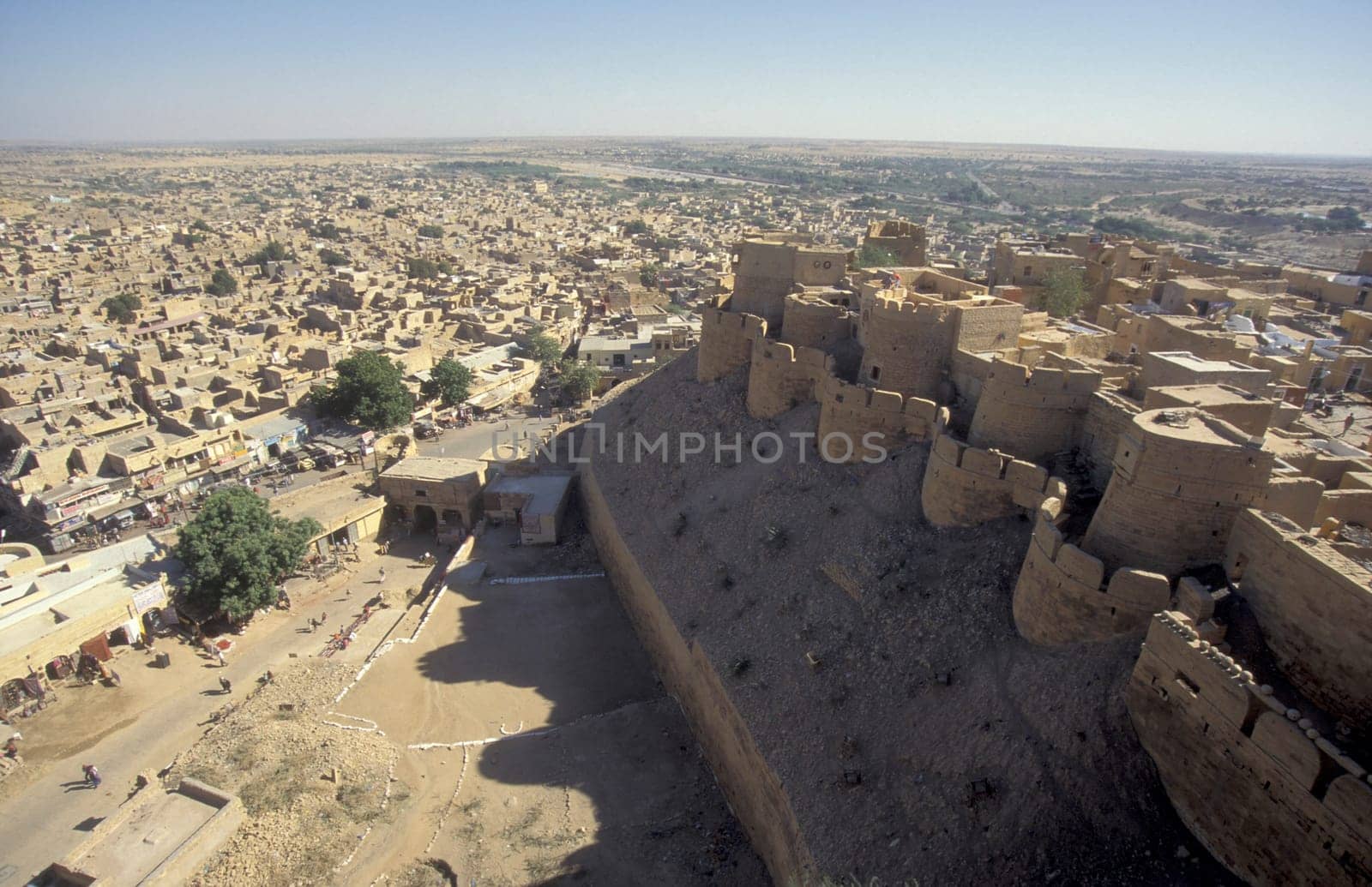 a view of the Jaisalmer Fort with the city of Jaisalmer in the Province of Rajasthan in India.  India, Jaisalmer, January, 1998