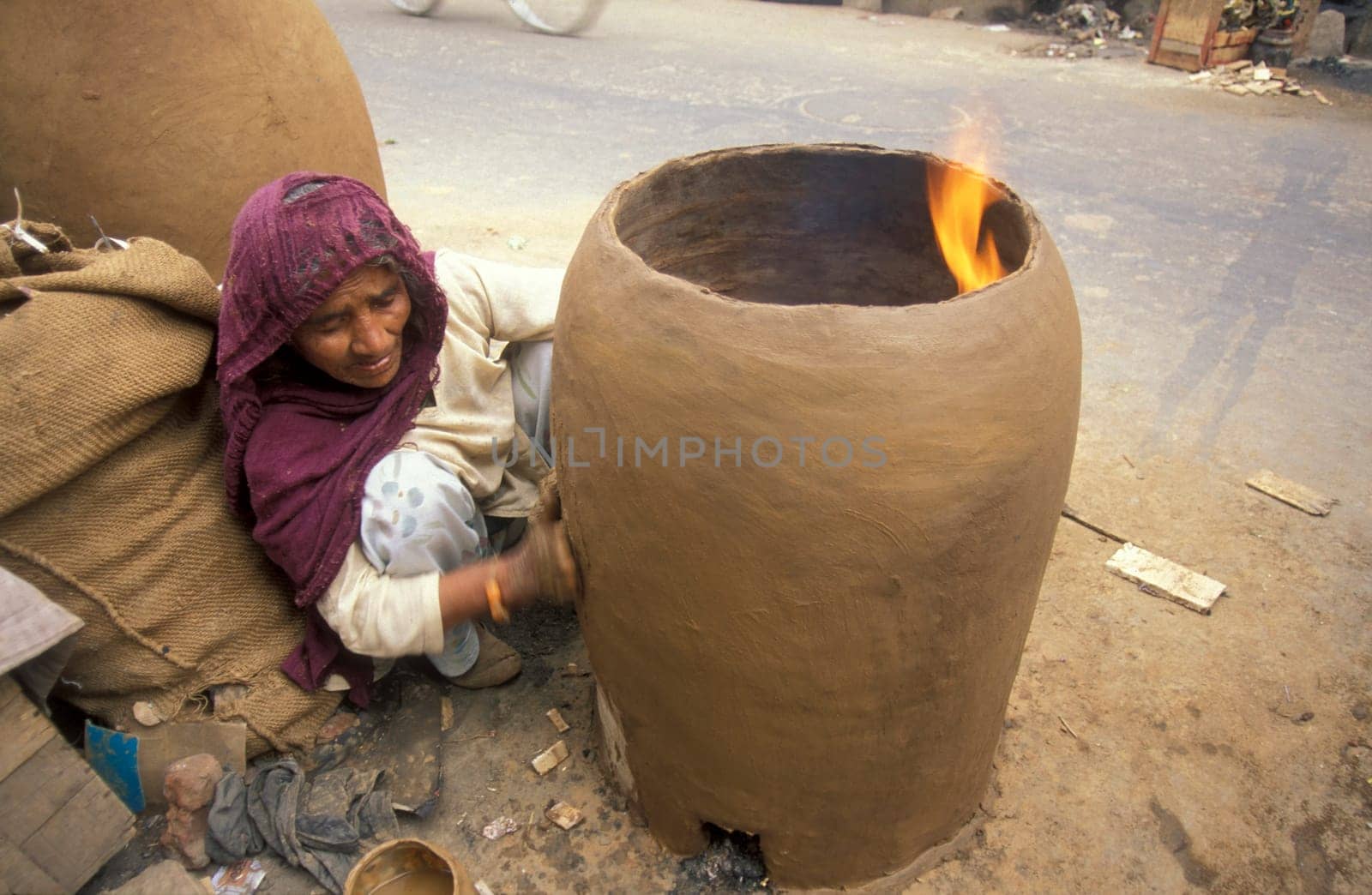 Working People in a Pottery Factory in the City of Jaipur in the Province of Rajasthan in India.  India, Jaipur, January, 1998