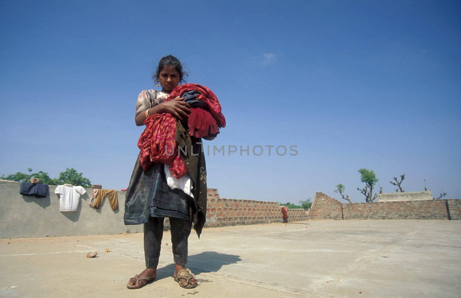 a women at her Laundry homework in the City of Jaipur in the Province of Rajasthan in India.  India, JAIPUR, January, 1998