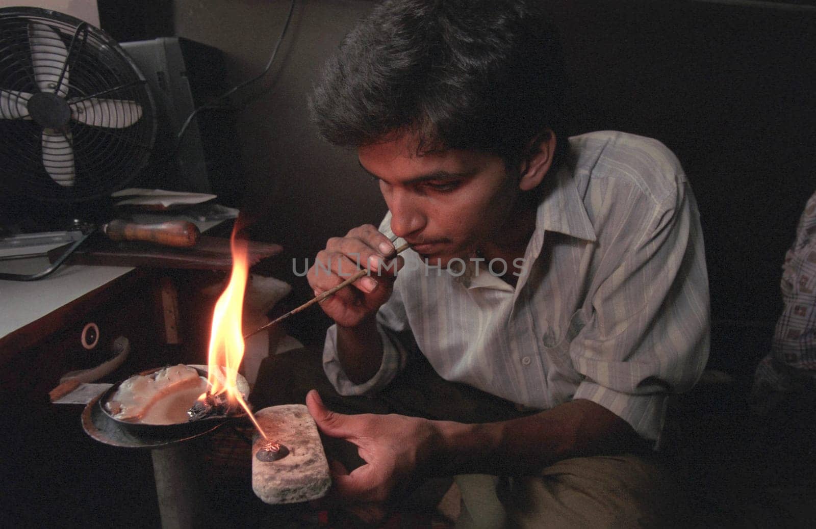 Working People in a Jewelry Factory in the City of Jaipur in the Province of Rajasthan in India.  India, Jaipur, January, 1998