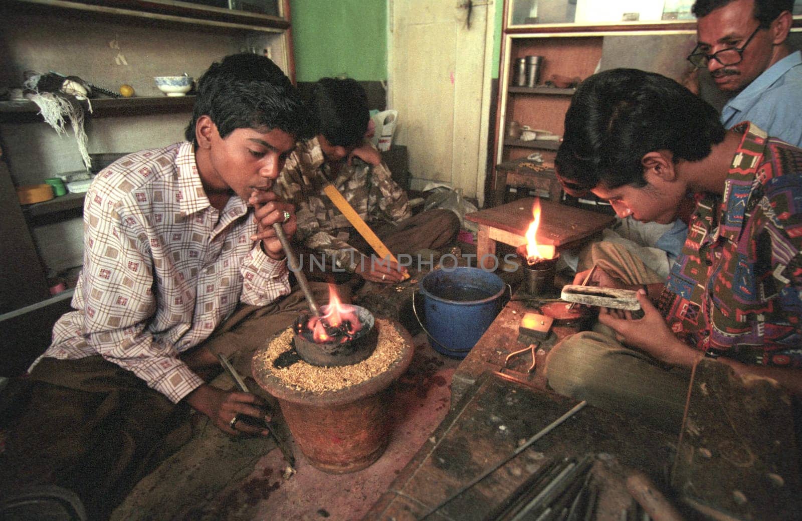 Working People in a Jewelry Factory in the City of Jaipur in the Province of Rajasthan in India.  India, Jaipur, January, 1998