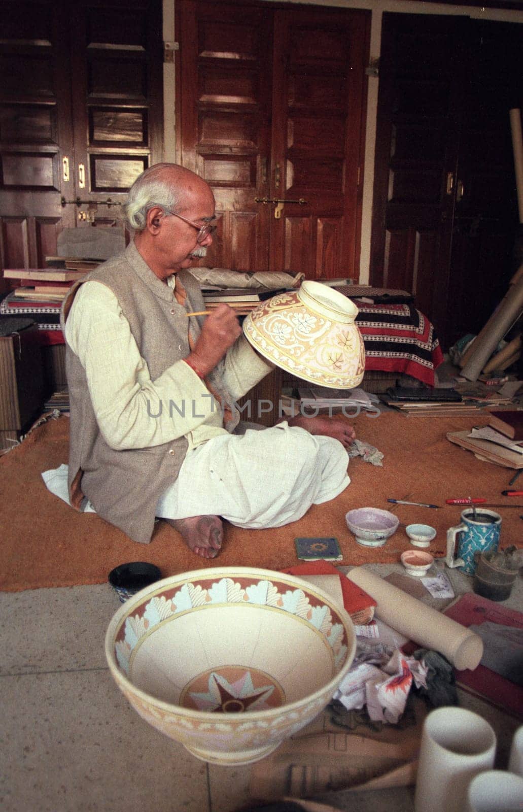 Working People in a Pottery Factory in the City of Jaipur in the Province of Rajasthan in India.  India, Jaipur, January, 1998