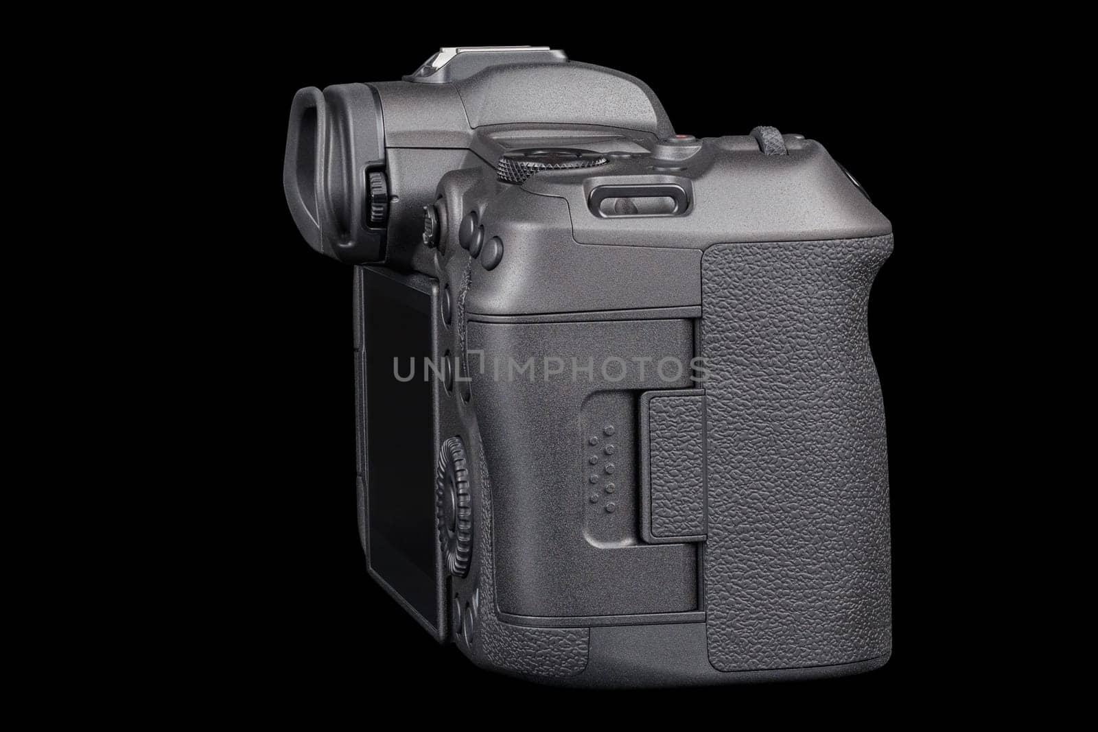 black 2020s professional 35mm full-frame mirrorless camera body with flip screen isolated on black background.