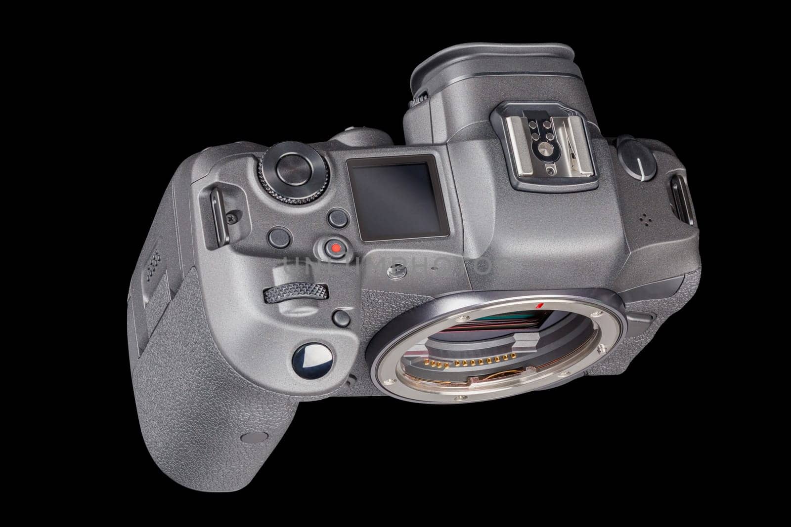 black 2020s professional 35mm full-frame mirrorless camera body with flip screen isolated on black background.