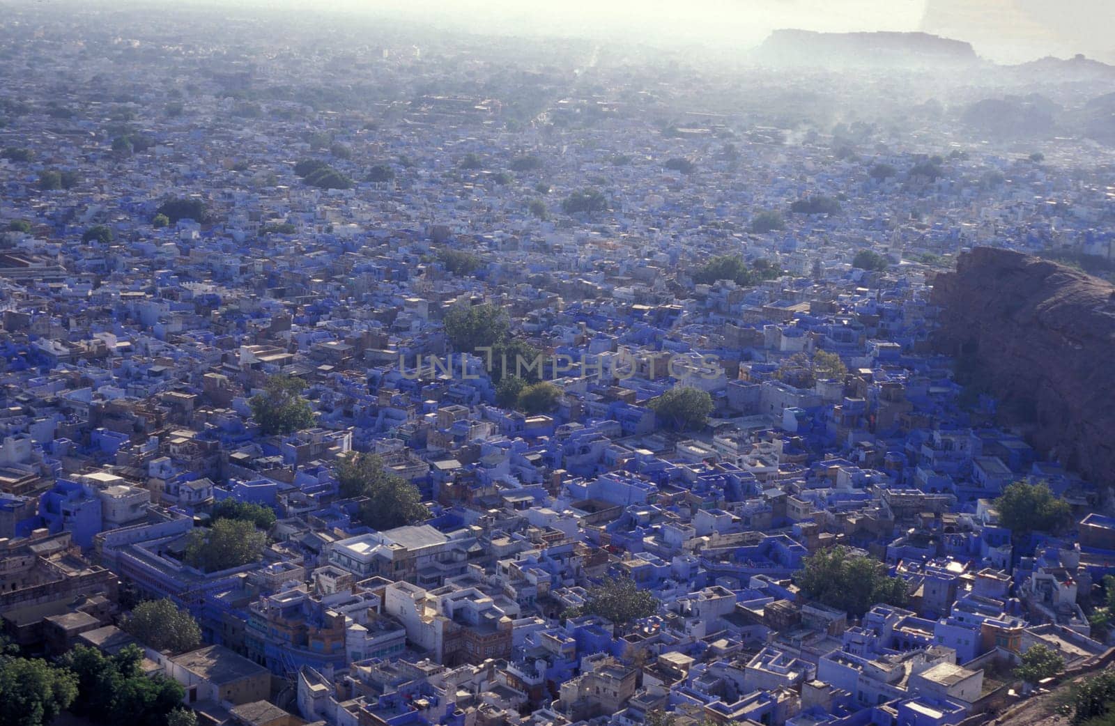 a view with living Houses in the Blue City and Town of Jodhpur in the Province of Rajasthan in India.  India, Jodhpur, January, 1998