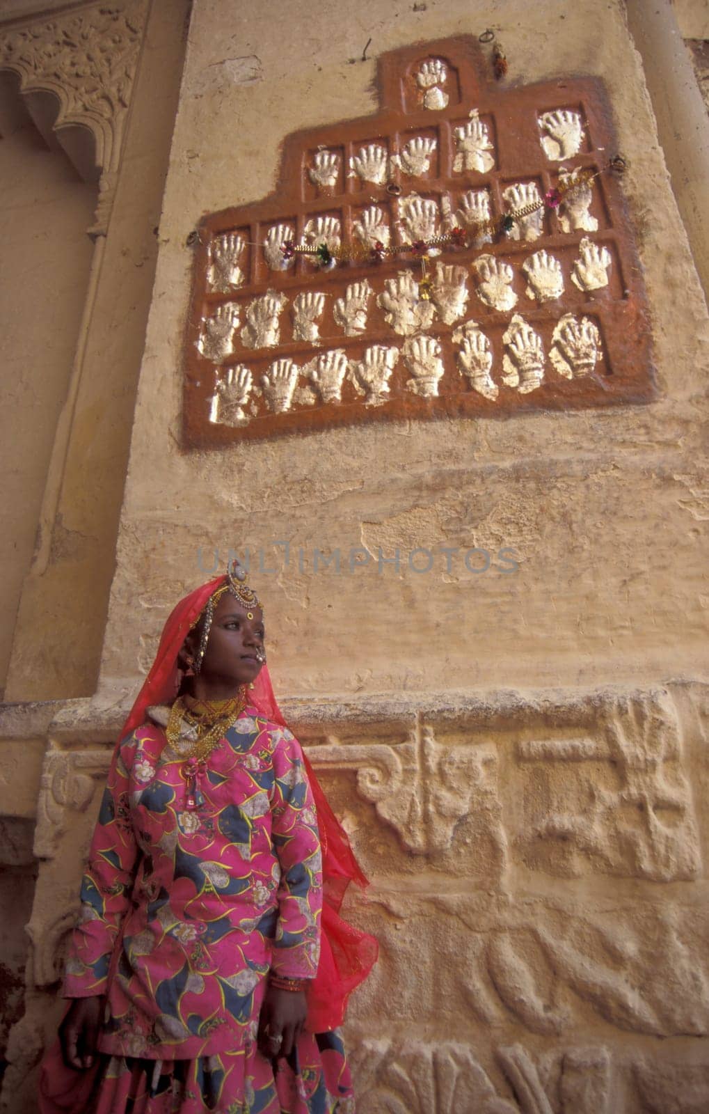 Women Queens Handprints of Sati and grid of Sculpted hands at the Meherangarh in the Town of Jodhpur in the Province of Rajasthan in India.  India, Jodhpur, January, 1998