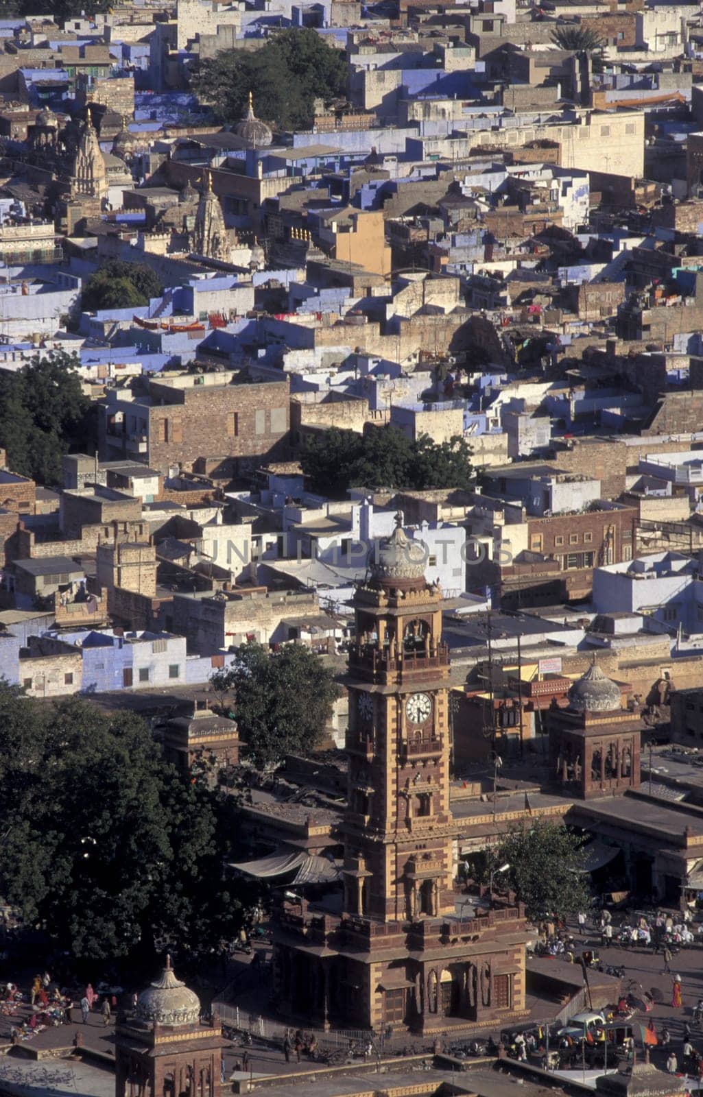 the clock Tower in the old Town of Jodhpur in the Province of Rajasthan in India.  India, Jodhpur, January, 1998