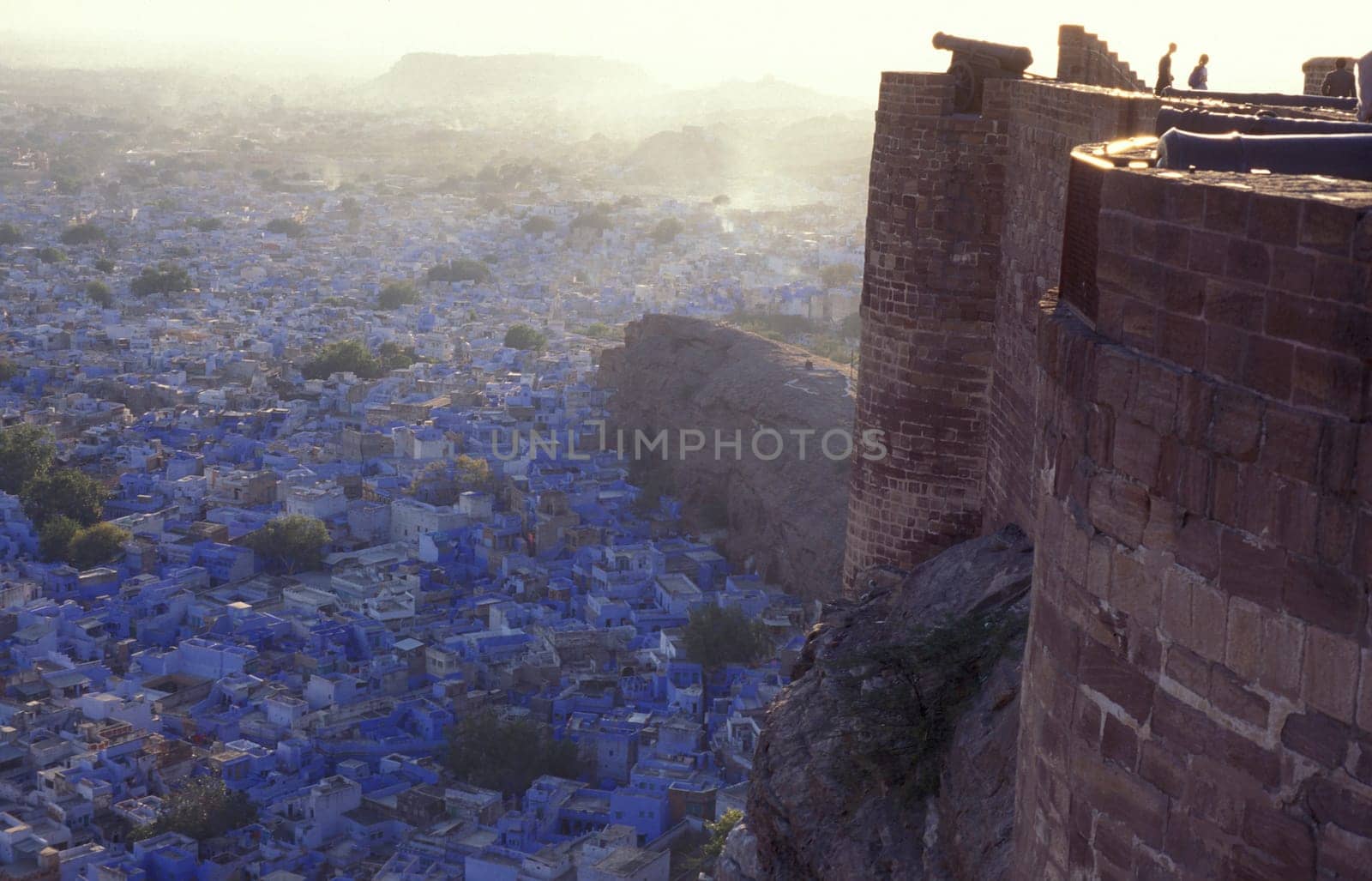 a view from the Meherangarh to the Town and Blue City of Jodhpur in the Province of Rajasthan in India.  India, Jodhpur, January, 1998