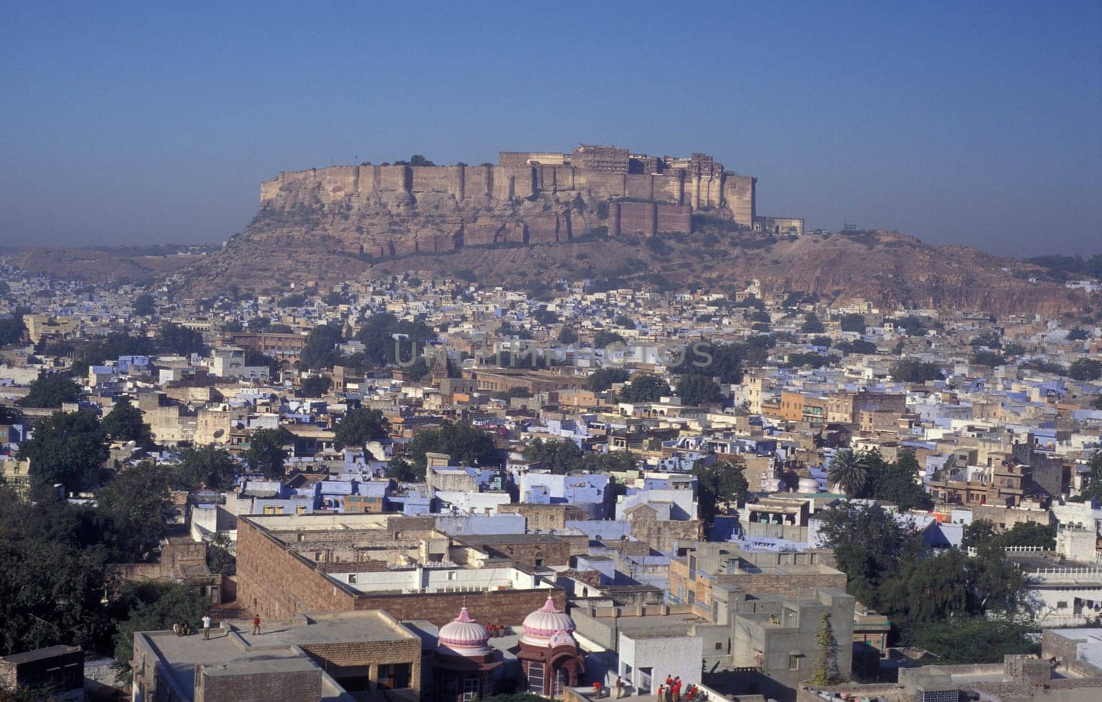 a view of the Meherangarh in the Town and Blue City of Jodhpur in the Province of Rajasthan in India.  India, Jodhpur, January, 1998